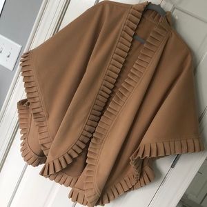 Pleated edge cape